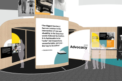 Centrally situated in this image is the third media pod. It sits within a black quarter-circle flooring area. The media pod is trimmed in wood, and the inside features black acoustic panels. A cushioned bench can be partially seen inside the media pod. This angle shows only one entrance into the media pod—the left entrance. A guest would enter and turn right to exit this media pod from this angle. On the wall extending from the opposite entrance is the title, “Advocacy.” The left entrance to the media pod includes a multi-panel grid of interpretive, photographic, and tactile object displays focused on rights movements, pre-ADA. The exterior center of the pod features a tall, white, curved wall that features a black dimensional quote from Yokasta Urena that reads, “The biggest barriers I face as a woman in the intersection of race and disability is the fancy buzz words followed by inaction. It is fashionable to be ‘woke’ but inopportune, uncomfortable, and over-the-top to be active.” The bottom-right corner of this wall features a teal quarter-circle design. To the left of the media pod in the background is the “We Are Many Things” entry grid wall. To the right of this media pod is a wooden wall, with a continuation of the square grid pattern featuring interpretive panels, brand color panels, and black and white portraits. At the very right of this view is the corner of a black piano with a tall black & white portrait of Stevie Wonder on the wall behind it. The piano sits atop a teal semi-circle. All other flooring is grey.