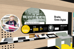 Along the north wall of the Change the World gallery, the Making Braille section continues featuring white, black, and light wood panels. A large IBM Printing Card Keypunch machine sits on the floor to the right of this space. A freestanding circular panel stands to the right of the machine. Behind the machine is a long, black panel with interpretive material with the words IBM and APH on it. Above is large, black dimensional lettering that reads, Braille Goes Digital. Above the black pill-shaped panel is a black and white photograph of a group of people standing behind piles of large books. Below the photograph is a yellow infographic of books to digital braille comparison. To the left-hand side of this wall, there are additional artifacts/products on a long white counter trimmed in wood. A color image of an APH employee at work appears above the counter on the far left, and a perforated light-wood wall form completes the space. Flooring changes appear in yellow, black, and light gray in this area.